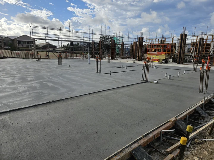 Completed concrete slab with columns under construction at Upper Coomera